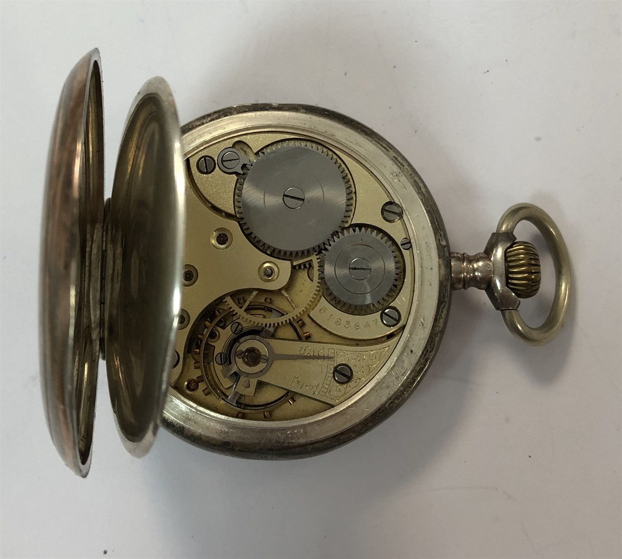 Omega - A Swiss silver open faced pocket watch and chain, - Bild 9 aus 12