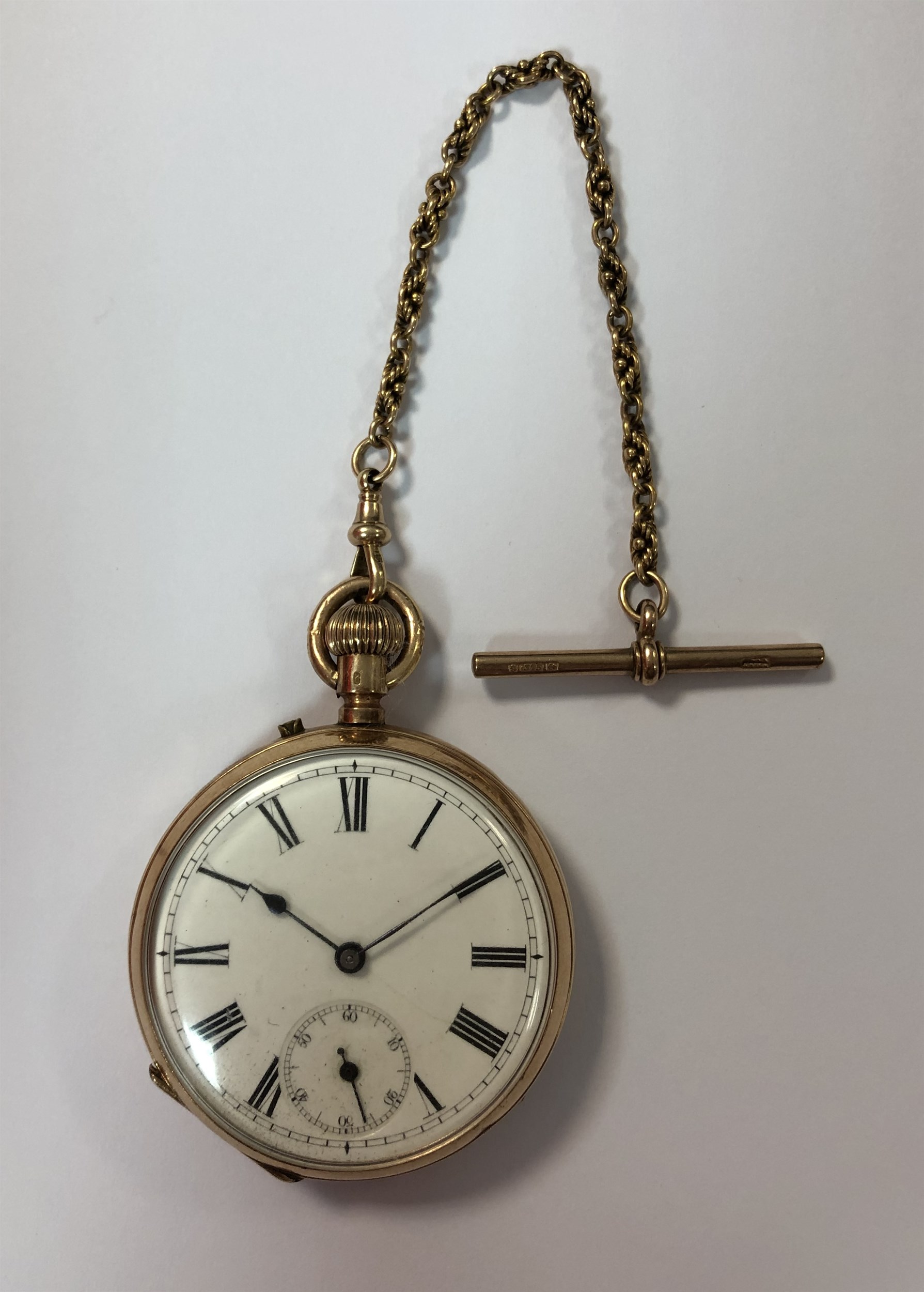 Unsigned - An early 20th century Swiss 14ct gold open faced pocket watch with Albertina chain,