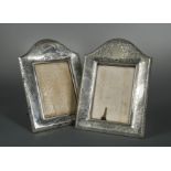 A pair of early 20th century American metalwares easel back photograph frames by Tiffany & Co,