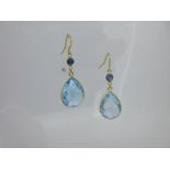 A pair of blue topaz and sapphire earpendants,