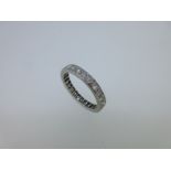 A diamond full hoop eternity ring,