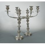 A pair of silver plated three light candelabra,