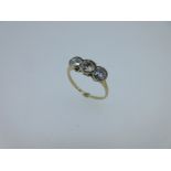 A diamond three stone ring,