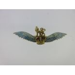 An enamelled RAF wings brooch,