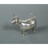 A continental metalwares Schuppe style cow creamer,