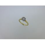 An 18ct gold single stone diamond ring,