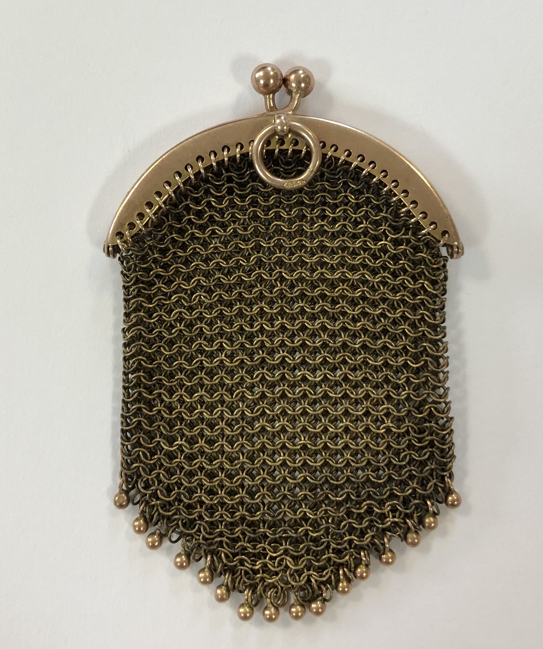 An Edwardian coin purse,