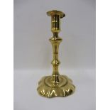 An 18th Century brass candlestick.