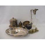 An Edwardian cut glass claret jug with silver plated mount, a silver plated biscuit barrel and