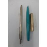 A Parker pen of unusual turquoise colour and one other.