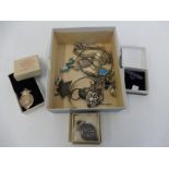 A small box of mixed silver to include medallions, bangles etc.