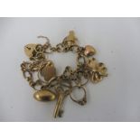 A 9ct gold charm bracelet.