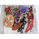 A tray of colourful bead necklaces etc.