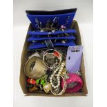 A box of assorted costume jewellery.