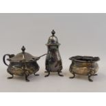 A silver three piece cruet set, Birmingham.