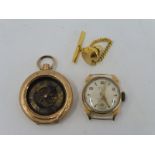 A small 18ct gold lady's wristwatch, lacking strap and a 14k gold pocket watch for restoration.