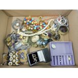 A tray of assorted jewellery including coral, beadwork purses etc.