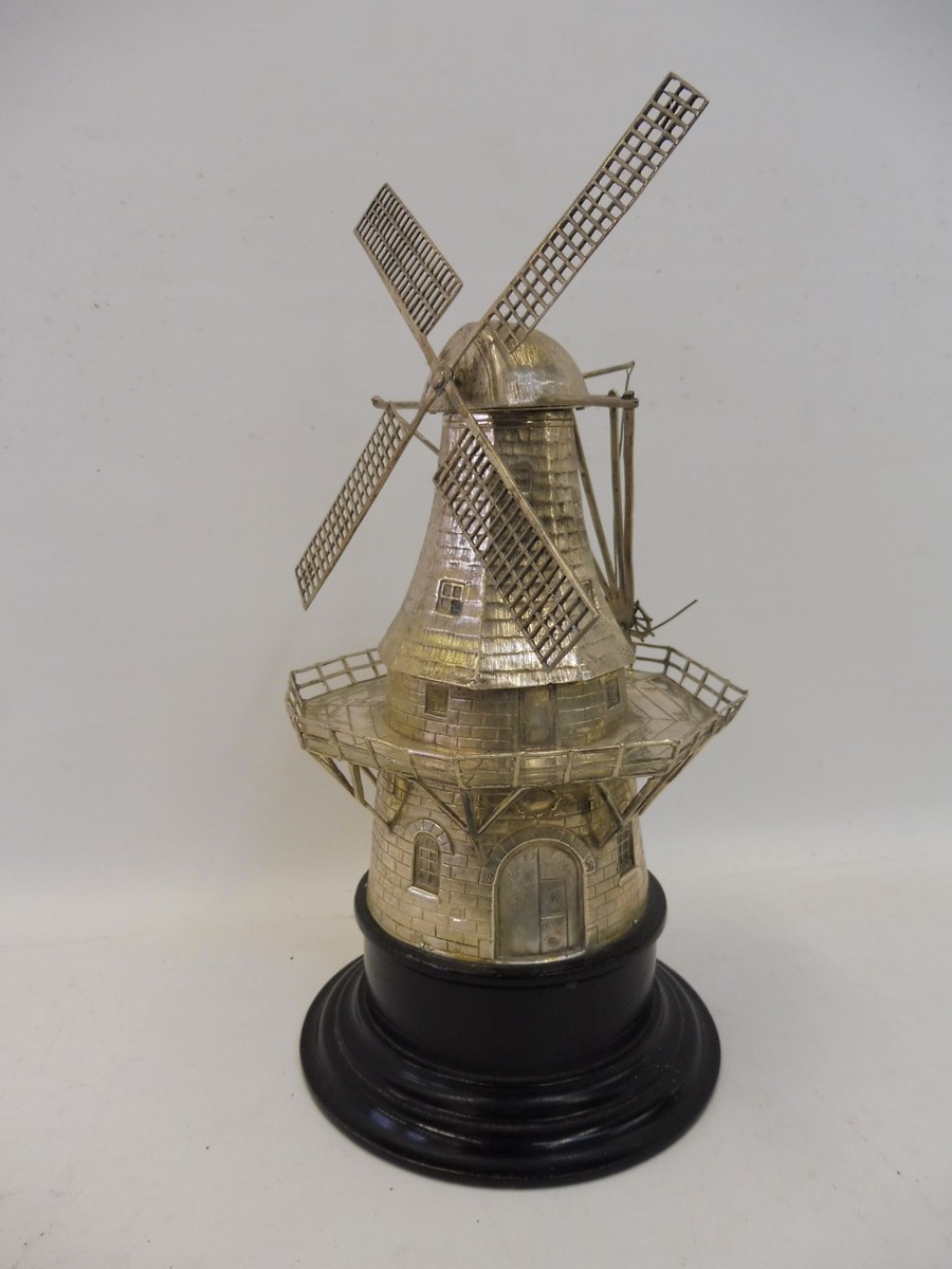 An unusual and rare silver model of a windmill, a well detailed model with rotating and revolving