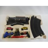 A Scalextric set with two Mini cars, partially boxed plus a boxed Scalextric C126 Lotus 77.