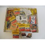 A tray of Action Man pamphlets and leaflets.