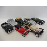 A selection of Burago die-cast models including the Jaguar E-type, Morgan, MG etc.