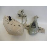 A group of original Star Wars models comprising a Darth Vader slave ship, a rebel transporter and