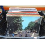 A box of 50+ LPs including Beatles, Two Tone, ELO and lots more genres, various conditions.