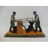 An early and rare Bing tinplate mechanical toy in the form of a wood cutter and an axeman, in very