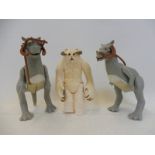 Two Star Wars Tauntauns with reins plus a Wampa.