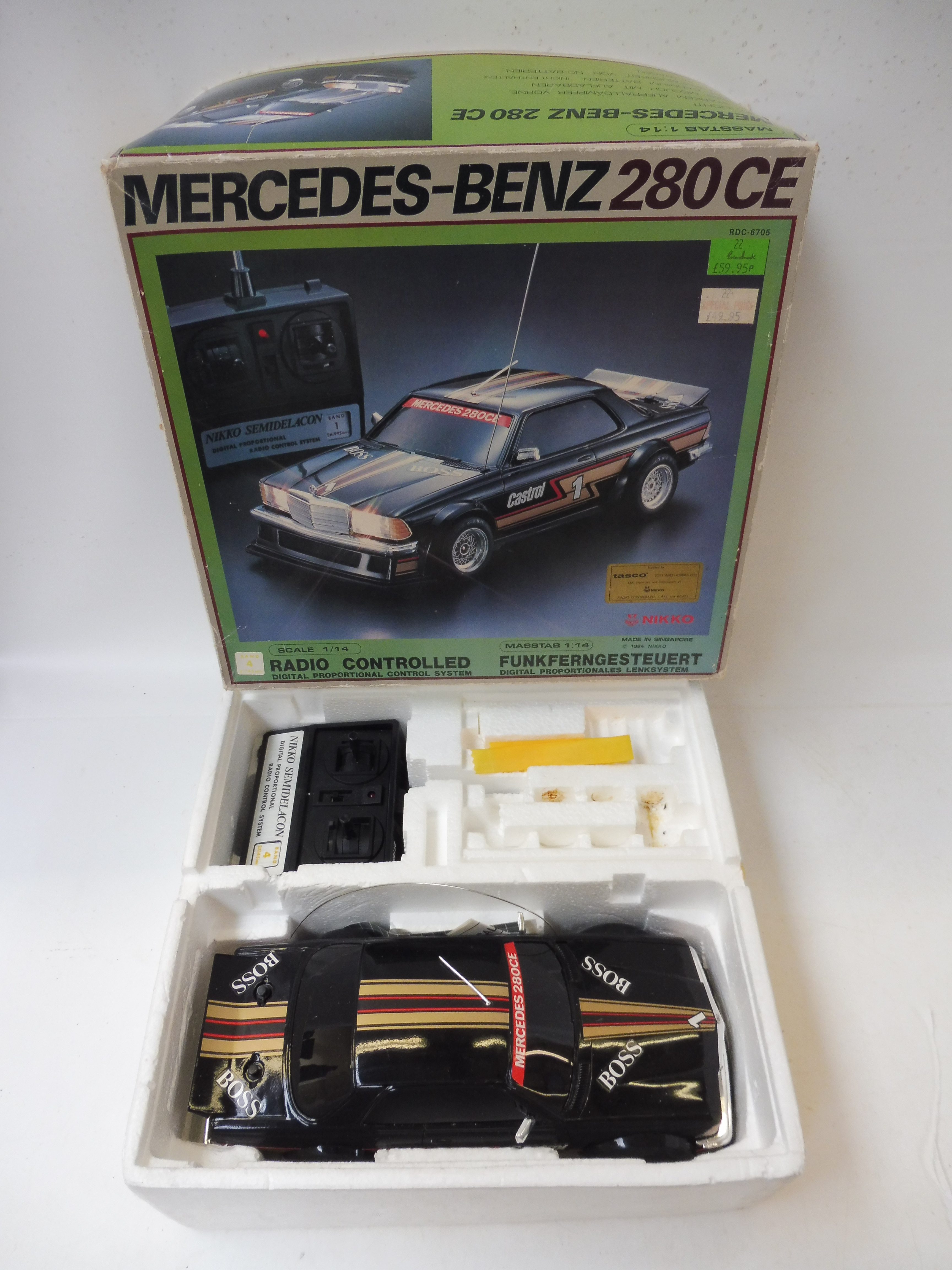 A boxed Mercedes-Benz 280CE radio controlled car.
