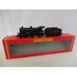 A boxed Hornby OO gauge Class 2P locomotive '579', R2099A LMS 4-4-0.