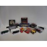 A selection of boxed and unboxed die-cast models including an Airfix Renault Dauphine kit in