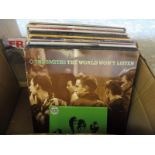 A box of 30+ vinyl albums include The Smiths, U2 etc. various conditions.