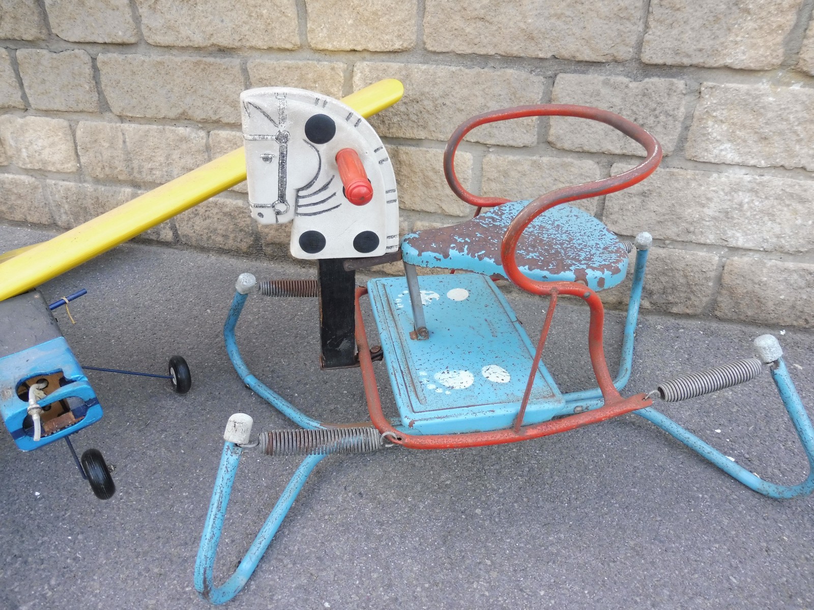 A tinplate child's rocker and a partial remote controlled model airoplane. - Image 2 of 3