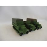 Three early Dinky military vehicles, repainted with new tyres, to a good standard.