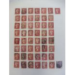 An album of assorted stamps, many GB including a page of Penny Reds.