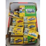 A box of Vanguards die-cast models, mostly cars from the 1960s, also a boxed Whitbread two piece set