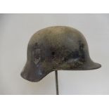 A Model 35 SS German helmet with double decal, probably from the 12th SS division conflict in 1944