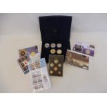 A Falkland Islands 1980 proof set plus various commemorative coins and stamps, some relating to