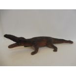 A taxidermist's study of a hatchling (young crocodile or aligator).