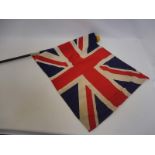 A small Union Jack flag on a wooden pole, possibly for mounting on the rear of a boat, 23 1/4 x