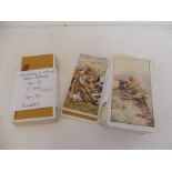 A selection of cigarette cards mainly military and war related.