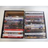 30 rock music DVDs including Led Zeppelin, The Who etc.