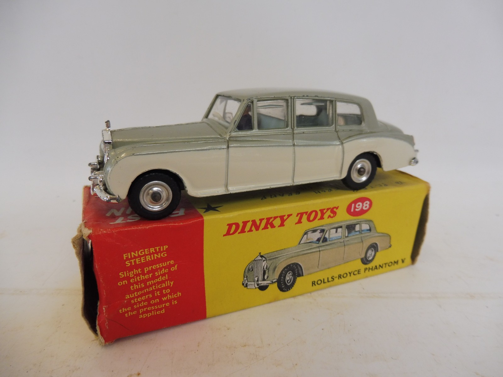 A boxed Dinky Toys Rolls-Royce Phantom 5, no. 198, in excellent condition.