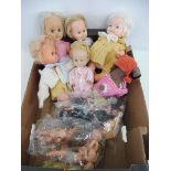 A box of mixed dolls, some early plastic dolls, costume dolls etc.