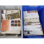 Two boxes of first day covers, mixed subject matters and ages.