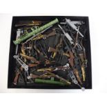 A tray of Action Man weapons.