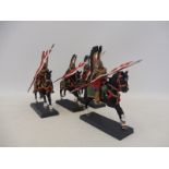 A good quality set of figures including winged Hussars, possibly Samurai, some damage.