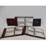 Three albums of Royal Mint First Day Covers and two smaller.