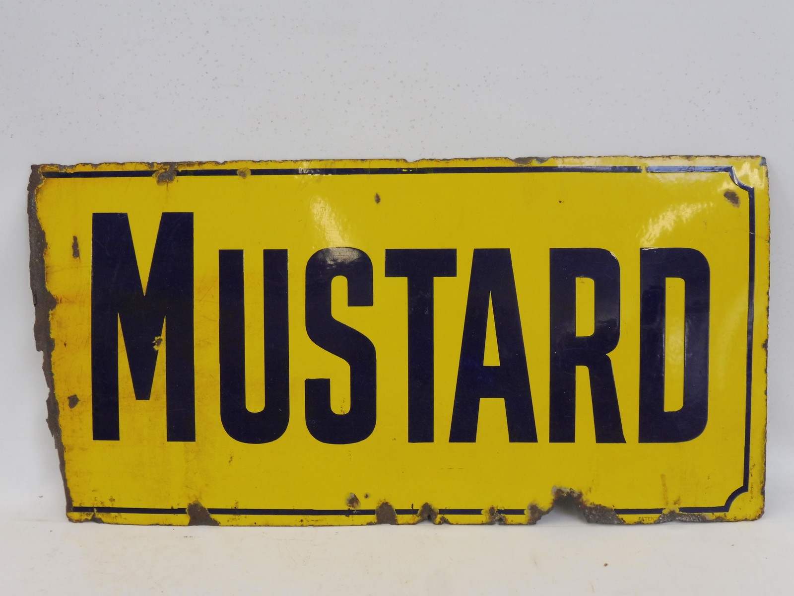 A Mustard partial enamel sign, 32 1/4 x 16".